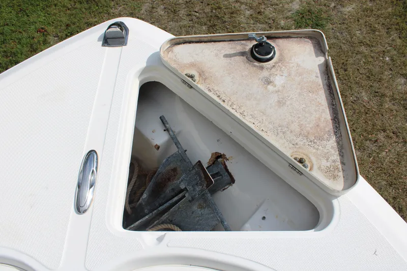 Slide: The Image of Open anchor compartment on 2009 Sea Fox 256CC Pro Series boat. - 21