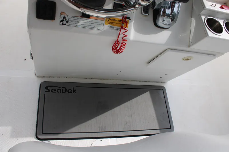 Slide: The Image of Sea Fox 256CC Pro Series 2009 boat console with SeaDek mat and controls. - 36