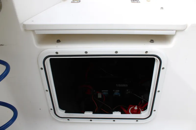 Slide: The Image of Open storage compartment on 2009 Sea Fox 256CC Pro Series boat. - 39