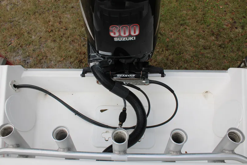 Slide: The Image of 2009 Sea Fox 256CC Pro Series with Suzuki 300 engine and rod holders. - 40