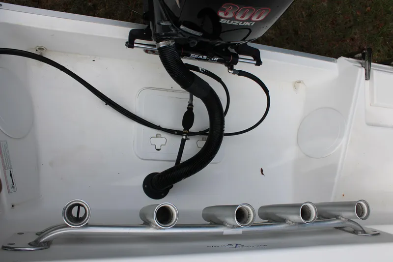 Slide: The Image of 2009 Sea Fox 256CC Pro Series boat with Suzuki 300 engine and rod holders. - 44