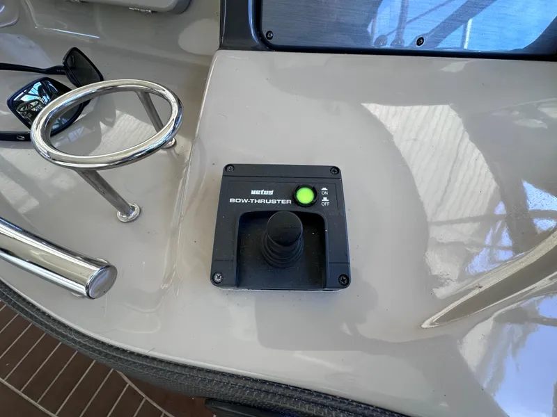 Slide: The Image of Bow thruster control on 2007 Sea Ray 44 Sundancer yacht dashboard. - 10