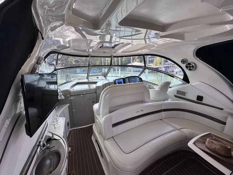 Slide: The Image of 2007 Sea Ray 44 Sundancer yacht interior with luxurious seating and modern amenities. - 13