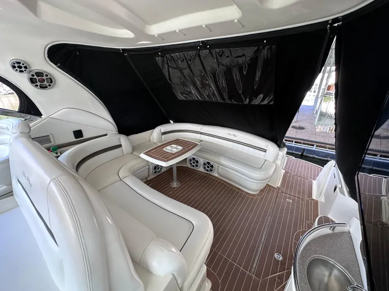 Slide: The Image of Luxurious interior of 2007 Sea Ray 44 Sundancer yacht with elegant seating and table. - 15