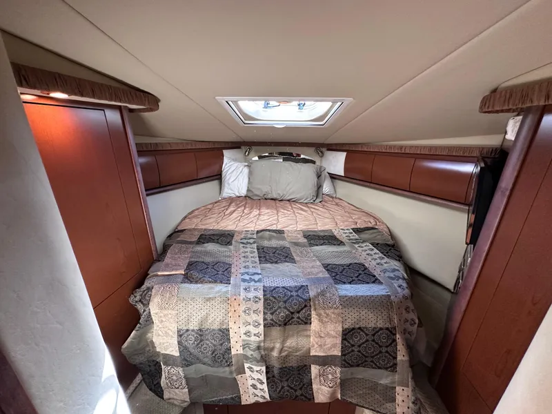 Slide: The Image of Luxurious cabin interior of 2007 Sea Ray 44 Sundancer yacht with cozy bed. - 22