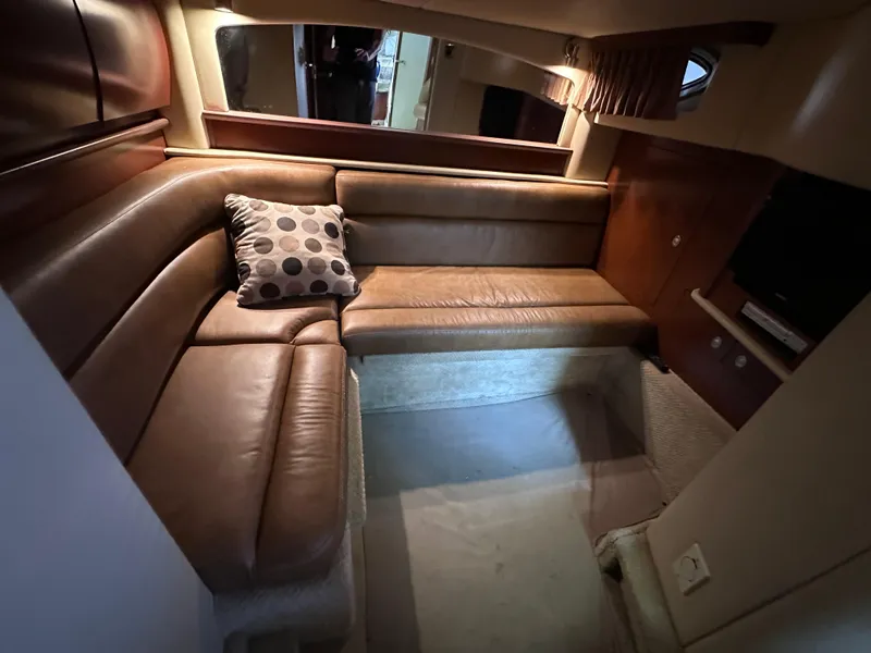 Slide: The Image of Luxurious 2007 Sea Ray 44 Sundancer cabin with leather seating and modern interior design. - 24