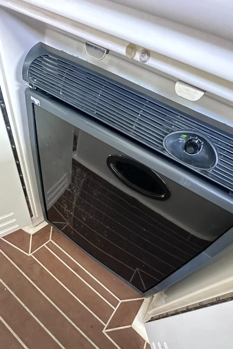 Slide: The Image of Compact refrigerator in 2007 Sea Ray 44 Sundancer yacht interior. - 31