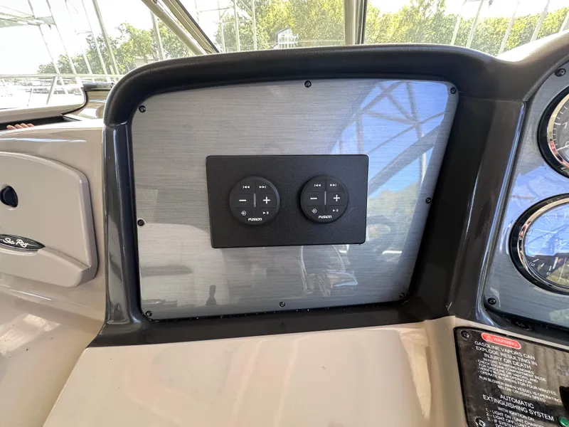 Slide: The Image of 2007 Sea Ray 44 Sundancer helm with control panel and gauges. - 9