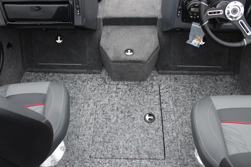 Slide: The Image of 2025 Tracker Targa V-18 Combo boat interior with gray carpet and seating. - 22