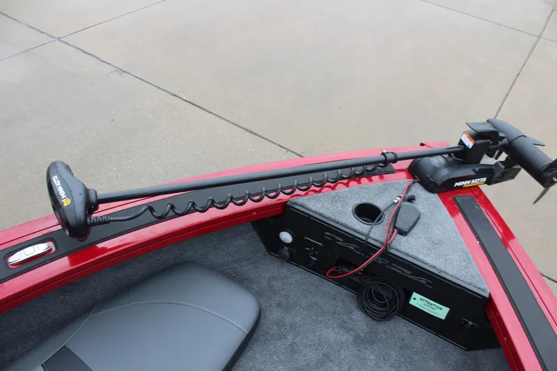 Slide: The Image of 2025 Tracker Targa V-18 Combo boat interior with trolling motor and seating. - 26