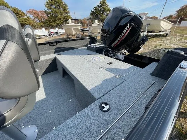 Slide: The Image of 2025 Lund 1650 Rebel XL SS boat with Mercury engine, outdoor display. - 22