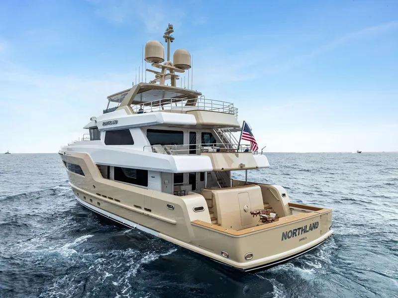 Slide: The Image of 2017 Burger 104 Motor Yacht cruising on open sea, featuring elegant design and luxury amenities. - 17