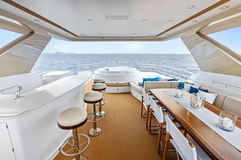 Slide: The Image of Luxurious 2017 Burger 104 Motor Yacht with elegant seating and ocean view. - 21