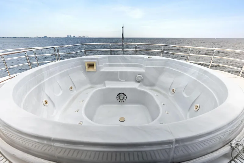 Slide: The Image of Luxurious jacuzzi on 2017 Burger 104 Motor Yacht with ocean view. - 24