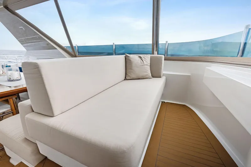 Slide: The Image of Luxurious seating area on 2017 Burger 104 Motor Yacht with ocean view. - 25