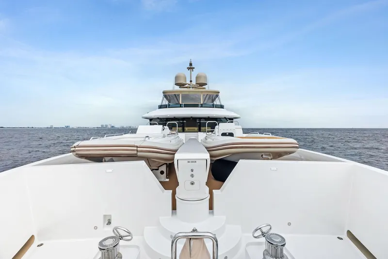 Slide: The Image of 2017 Burger 104 Motor Yacht on open water, showcasing sleek design and luxury features. - 29