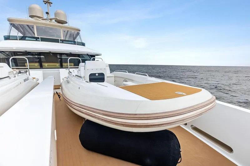 Slide: The Image of 2017 Burger 104 Motor Yacht with tender on deck, ocean view. - 34