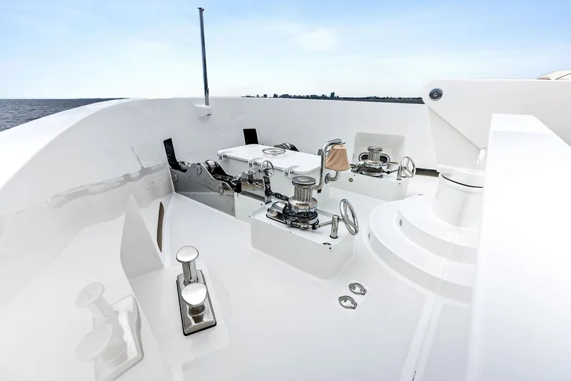 Slide: The Image of 2017 Burger 104 Motor Yacht deck with winches and cleats. - 35