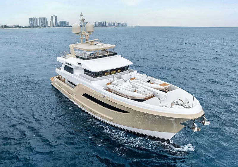 Slide: The Image of Luxurious 2017 Burger 104 Motor Yacht cruising on open sea. - 4