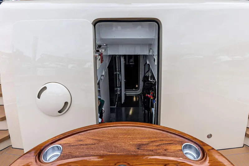 Slide: The Image of Entrance to the engine room of a 2017 Burger 104 Motor Yacht. - 41