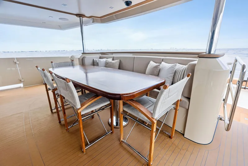 Slide: The Image of Luxurious dining area on 2017 Burger 104 Motor Yacht with ocean view. - 43