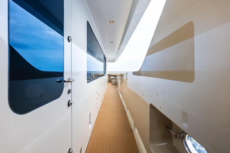 Slide: The Image of Side deck view of 2017 Burger 104 Motor Yacht, showcasing sleek design and modern features. - 47