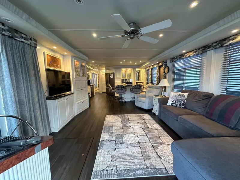 Slide: The Image of Luxurious 2001 Sharpe 16x80 houseboat interior with modern decor and spacious living area. - 14