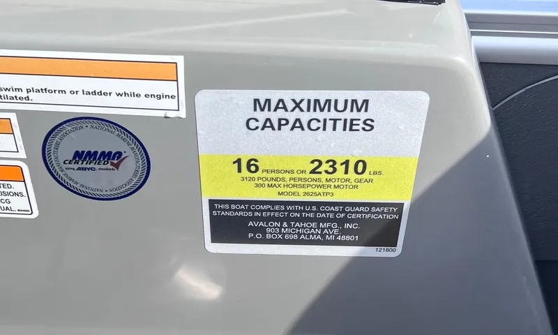 Slide: The Image of 2023 Avalon Catalina Elite Windshield capacity label, 16 persons or 2310 lbs, US Coast Guard compliant. - 3