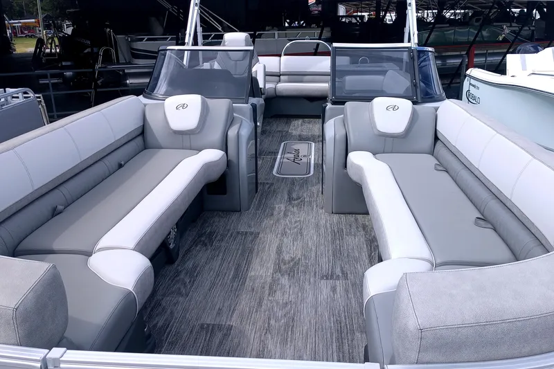 Slide: The Image of 2023 Avalon Catalina Elite Windshield boat interior with luxurious seating and modern design. - 7