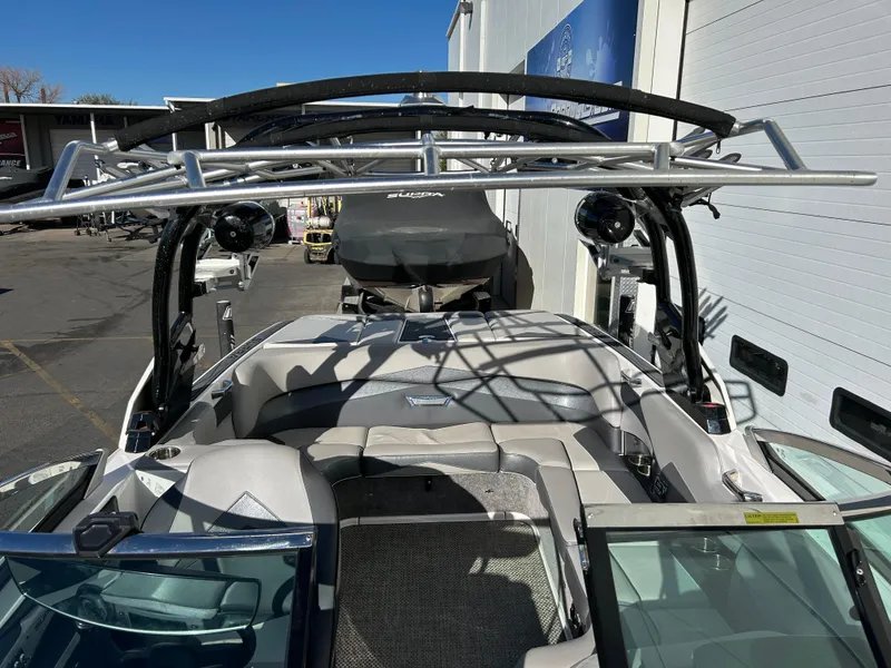 Slide: The Image of 2015 Supra SC400-550 boat interior with seating and wakeboard tower. - 6