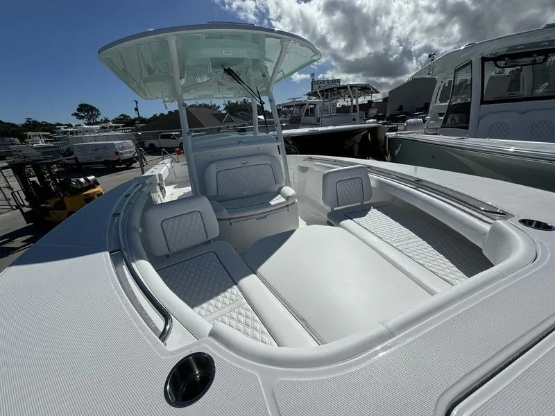 Slide: The Image of 2025 Southport 30 FE boat with spacious seating and sleek design. - 10