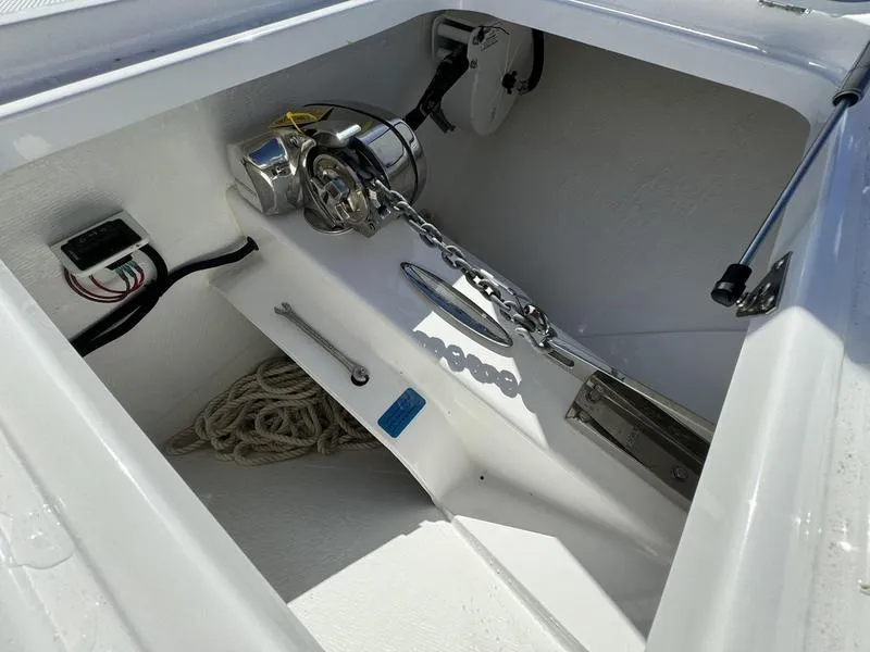 Slide: The Image of Anchor compartment of 2025 Southport 30 FE boat with chain and rope. - 12