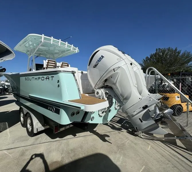 Slide: The Image of 2025 Southport 30 FE boat with Yamaha engine on trailer, sunny day. - 3