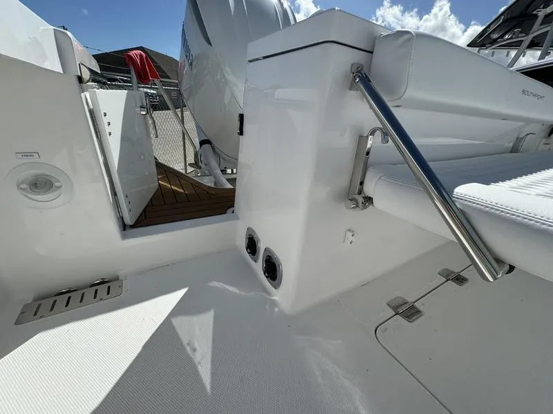Slide: The Image of 2025 Southport 30 FE boat interior, featuring sleek white design and modern fittings. - 42