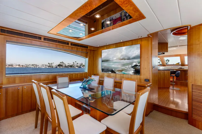 Slide: The Image of Luxurious 2005 Horizon Custom Yacht interior with elegant dining area and scenic ocean views. - 33