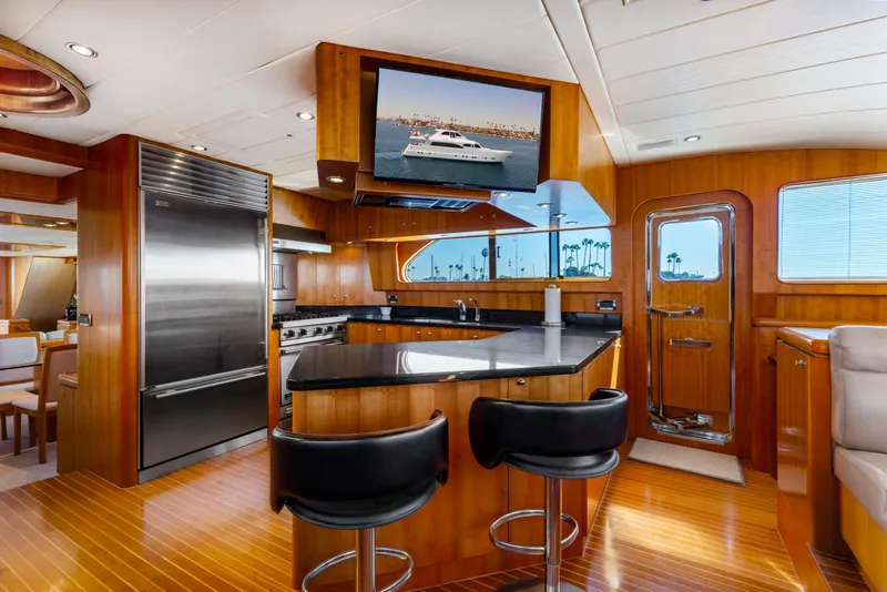 Slide: The Image of Luxurious 2005 Horizon Custom Yacht interior with modern kitchen and seating area. - 38