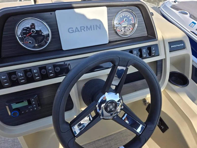 Slide: The Image of Steering console of 2025 Godfrey Sweetwater 2086 C with Garmin navigation system. - 14