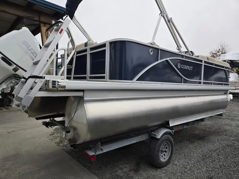 Slide: The Image of 2025 Godfrey Sweetwater 2086 C pontoon boat on trailer, side view. - 4