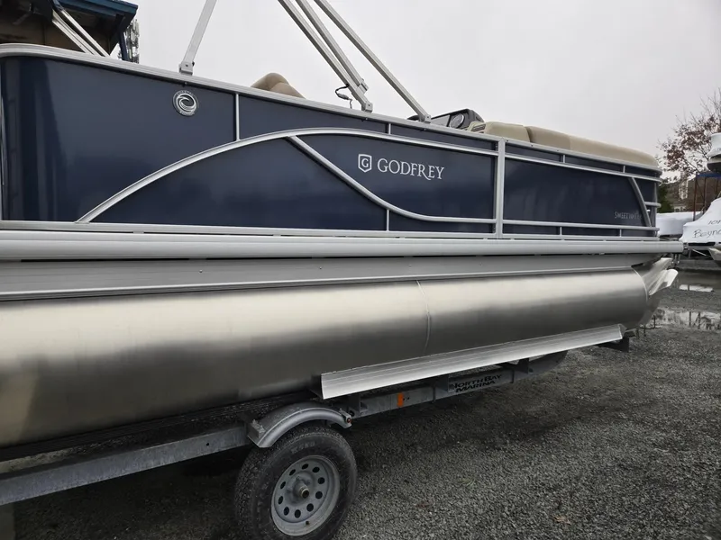 Slide: The Image of 2025 Godfrey Sweetwater 2086 C pontoon boat on trailer, side view. - 5