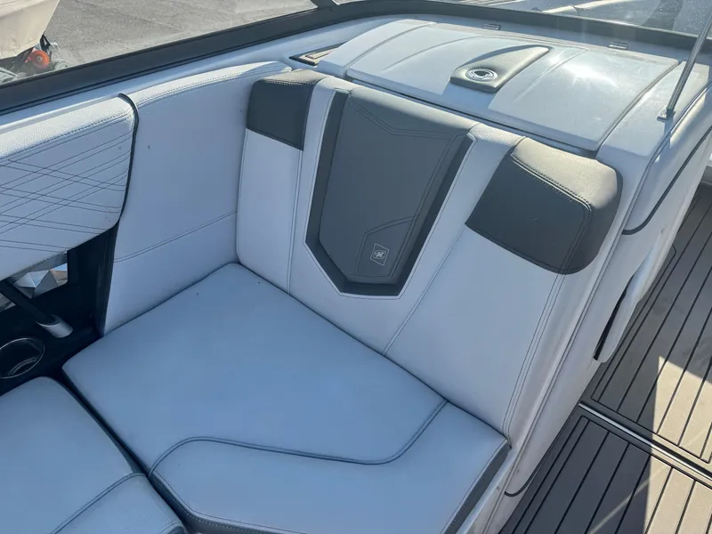 Slide: The Image of 2017 Nautique G25 boat interior seating with sleek, modern design and premium upholstery. - 8