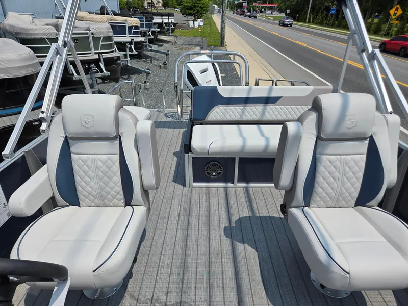 Slide: The Image of 2025 Godfrey SWEETWATER 2286 SFL pontoon boat interior with plush seating and modern design. - 10