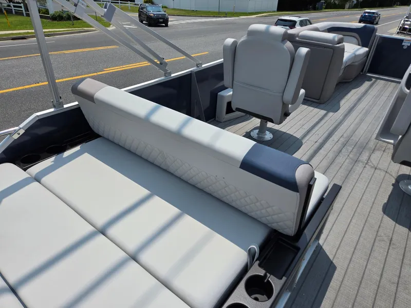 Slide: The Image of 2025 Godfrey SWEETWATER 2286 SFL pontoon boat interior with plush seating and modern design. - 23