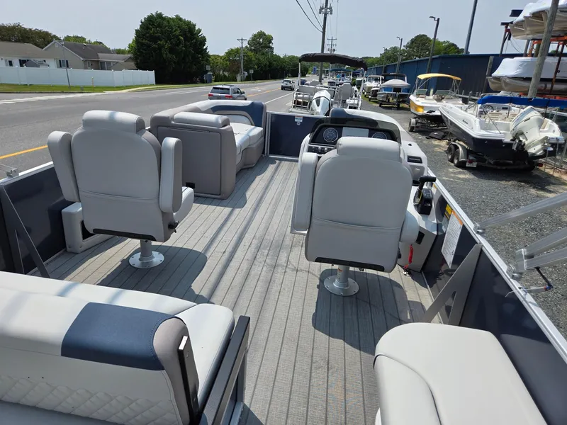 Slide: The Image of 2025 Godfrey SWEETWATER 2286 SFL pontoon boat with spacious seating and modern design. - 25