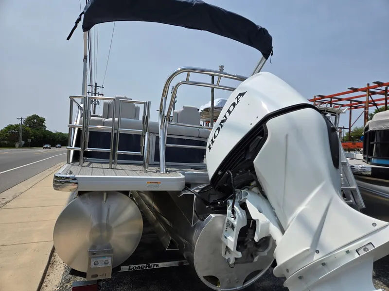 Slide: The Image of 2025 Godfrey SWEETWATER 2286 SFL pontoon boat with Honda outboard motor. - 3