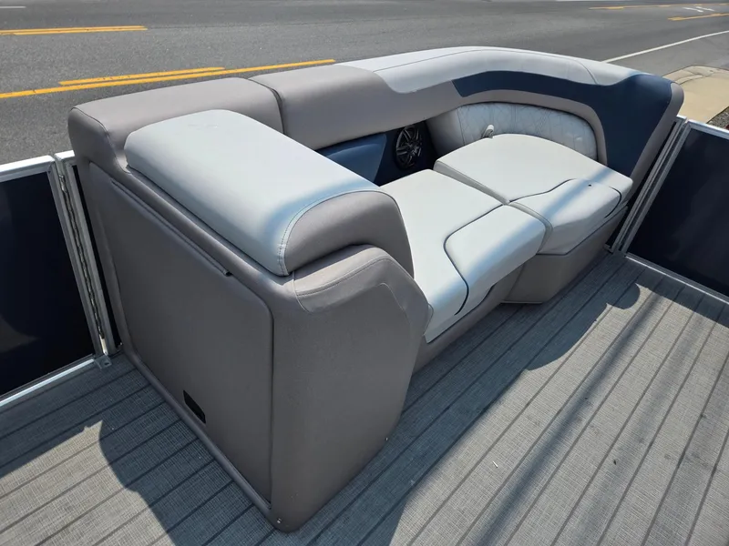 Slide: The Image of 2025 Godfrey SWEETWATER 2286 SFL pontoon boat seating, gray upholstery, outdoor setting. - 33