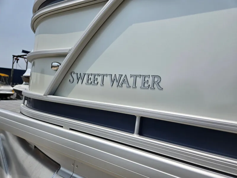 Slide: The Image of 2025 Godfrey SWEETWATER 2286 SFL boat, close-up of side branding. - 34