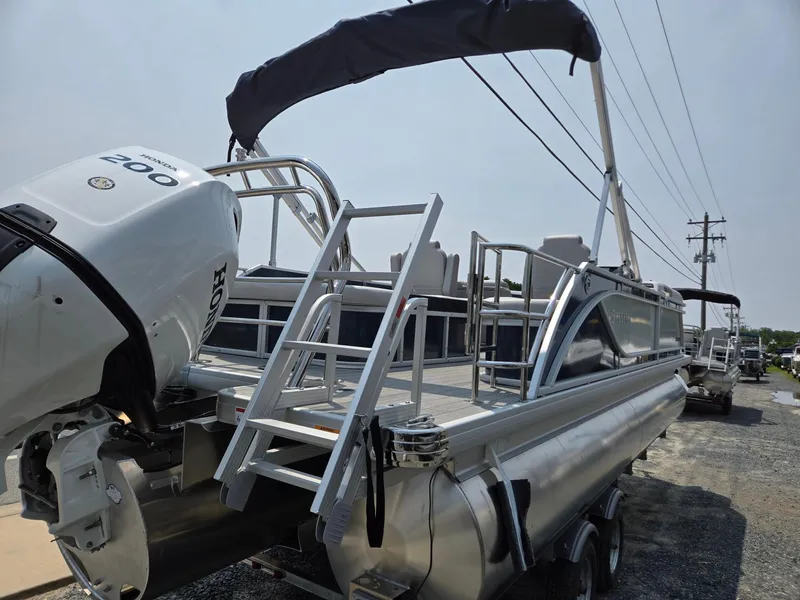 Slide: The Image of 2025 Godfrey SWEETWATER 2286 SFL pontoon boat with Honda outboard motor. - 4