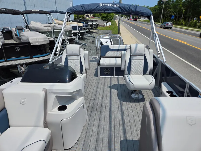 Slide: The Image of 2025 Godfrey SWEETWATER 2286 SFL pontoon boat with spacious seating and modern design. - 7
