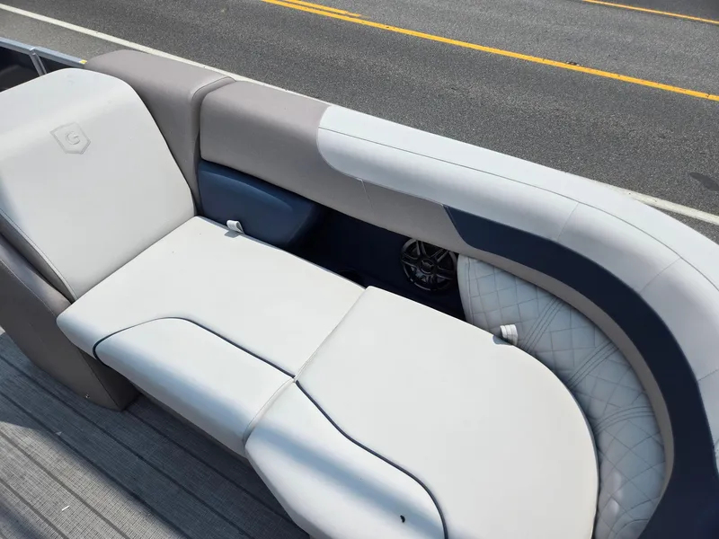 Slide: The Image of 2025 Godfrey SWEETWATER 2286 SFL boat seat with modern design and comfortable upholstery. - 9