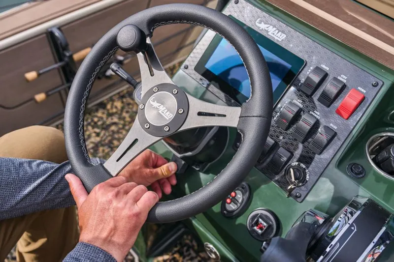 Slide: The Image of Steering console of 2025 Mako Pro Skiff 18 Backwater Edition boat. - 26